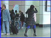 Bottes à talons marteau et collants bleus- Hammer heeled boots and blue tights- Aéroport de Montreal- 18 octobre 2008