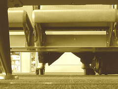 Lady  76 - Chubby black blond Lady in chunky heeled shoes /  Brussels airport - October 19th 2008- Sepia