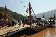 Getting on the ferry to cross the Mekong river