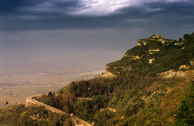 Dark clouds over sunny valley