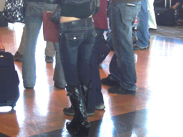 Young sexy blond in Bossy Boots with a gorgeous bum in jeans- PET Montreal airport