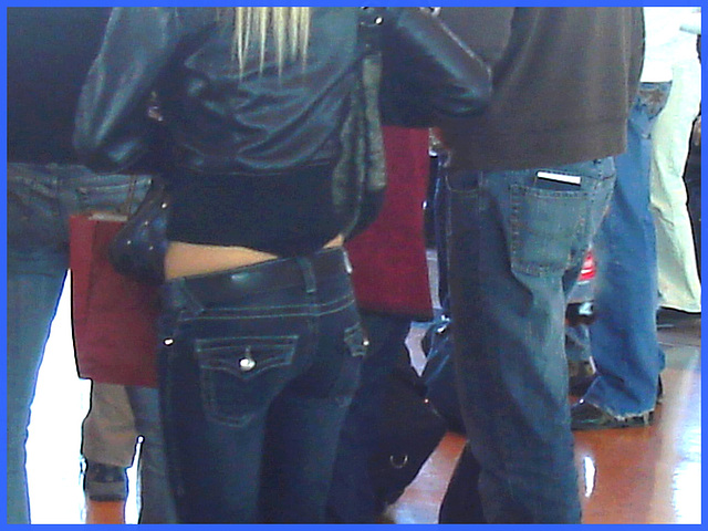 Young sexy blond in Bossy Boots with a gorgeous bum in jeans- PET Montreal airport