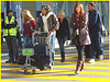 High heeled Boots and tights on yellow lines -  Bottes à talons hauts et collants sur lignes jaunes- Aéroport de Montréal. 18/10/2008