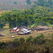 Village in the destroyed field near the Plain of Jars