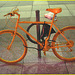 Yelloworange bike- Art ostentatoire du cycliste narcissique- flashless - Toronto, Canada. 1-07-2007.