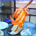 Greek octopus snack -Pieuvre à la grecque- Avec flash-Toronto. Canada. 1er Juillet 2007.