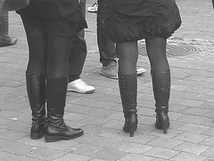 7 Eleven Swedish blond duo in dominatrix and flat leather Boots - Helsingborg / Sweden.  October 22th 2008.-  B & W
