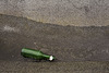 Bottle in a puddle