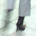 Bottes à talons aiguilles et jambe tremblante - Stiletto Boots and trembling leg -  Pet Montreal airport . - Blurry close-up.