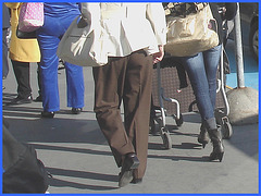 Mature in long pants and chunky heels / Dame mature en souliers à gros talons carrés -  PET Montreal airport / Aéroport Pierre-Elliot Trudeau de Montréal.