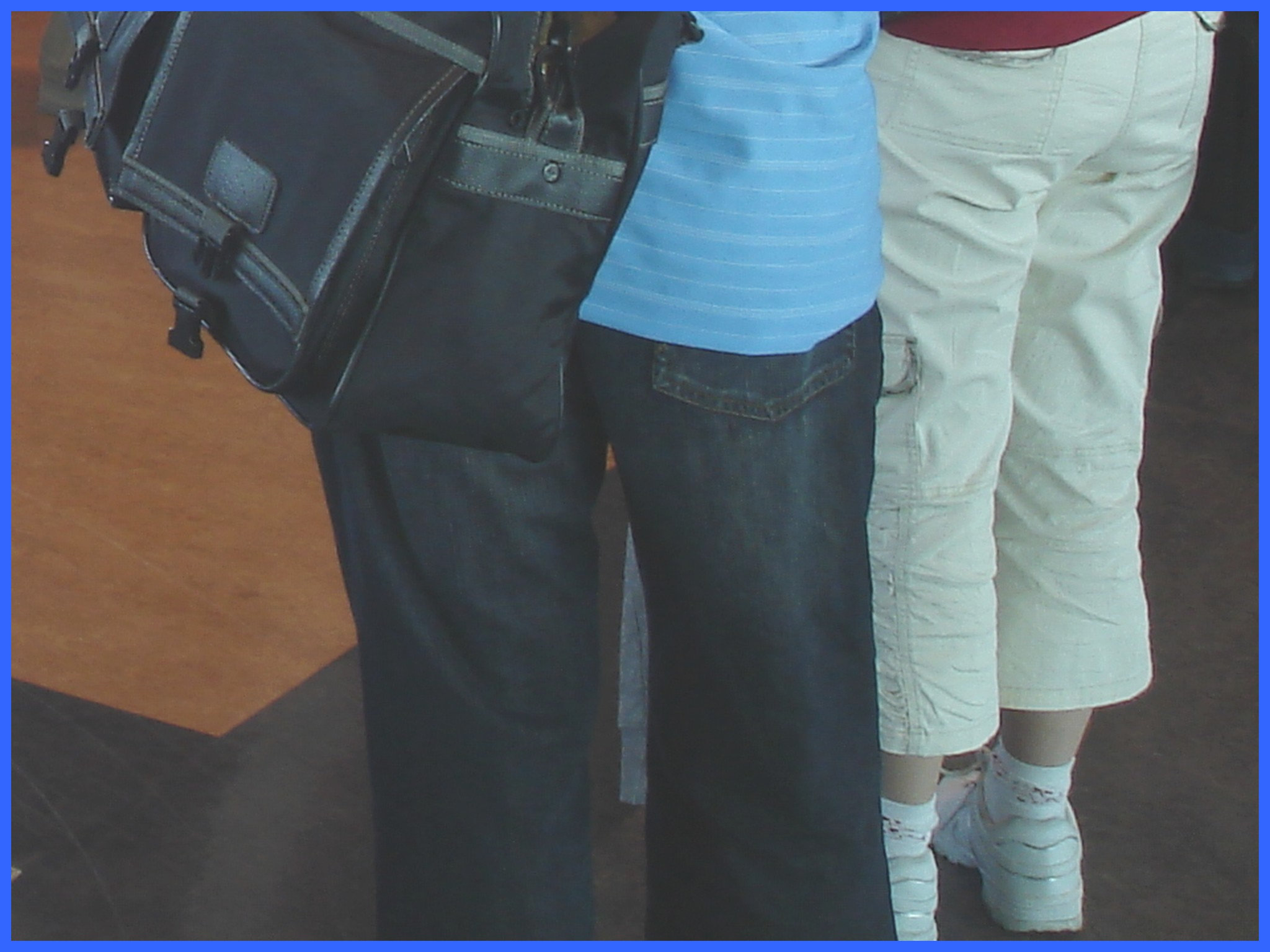 Blond mature in white sneakers -  Dame blonde du bel âge en espadrilles blanches - PET Montreal airport-