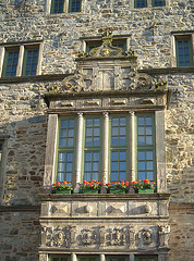 Old Oriel with typical crest on the market place in Rinteln