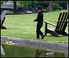 Boy with radio-controlled boat