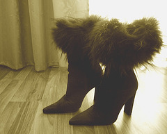 Elsa's friend fur high-heeled boots .  January 2009. Sepia