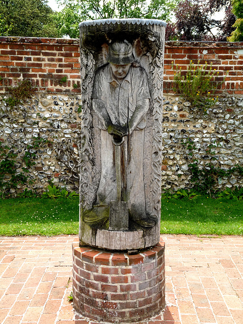 Wooden Statue of a Gardener
