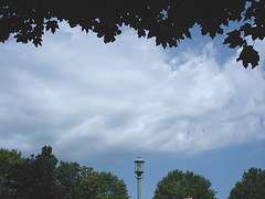 Lampadaire avec ciel et arbres  /   Street lamp with sky and trees.   Hometown  / Dans ma ville.  15 juillet 2009