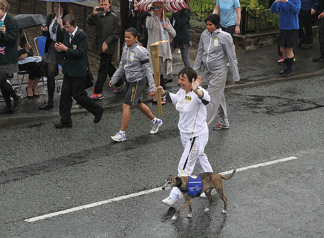 Torchbearer and her dog