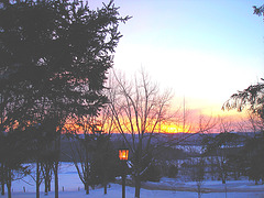 Lever de soleil sur l'abbaye de St-Benoit-du-lac /  Québec. CANADA -  7 Février 2009