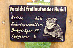 Vorsicht(,) freilaufender Hund!