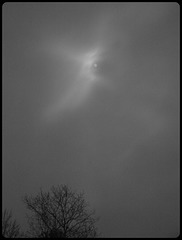 Snow clouds cover the moon