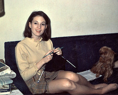 Mary at Christmas with her dog, Cricket; Greenville, IL, 1968,