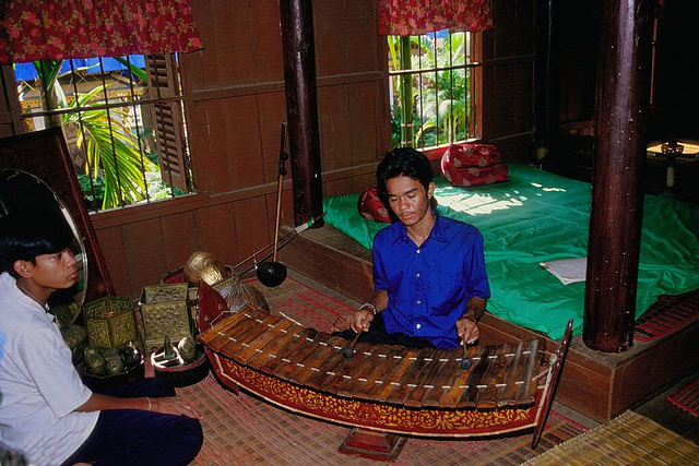 Playing the Roneat the Cambodian sticcado