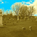 Cimetière catholique romain / Catholic roman cemetery - St-Jacques le majeur- Clarenceville- Noyan. Québec, Canada. 21-11-2009 - Sepia avec ciel bleu photofiltré