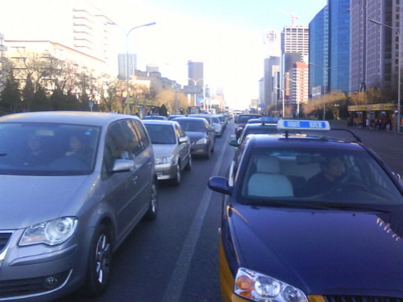 Cars standing on Jianguomen Wai