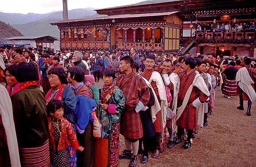 Local people waiting to touch the Thanka