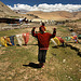 Tibetan nomad boy with prayer flags