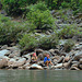 Women wait for a river ride on Nam Ou