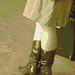 Blonde danoise à chapeau en bottes à talons hauts / Blond danish hatter in high-heeled boots -  Copenhagen, Denmark / Copenhague, Danemark.   20 octobre 2008 -  Sepia postérisé