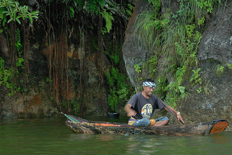 Other fisherman in his log-boat