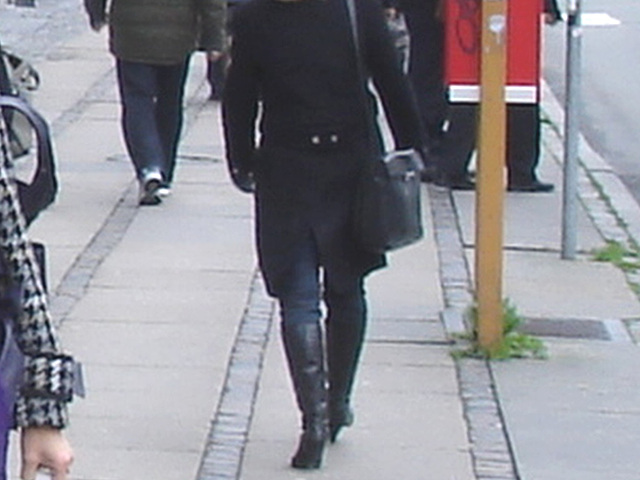 Black coat pony tail booted danish  blond  / Copenhagen, Denmark.  20-10-2008 -