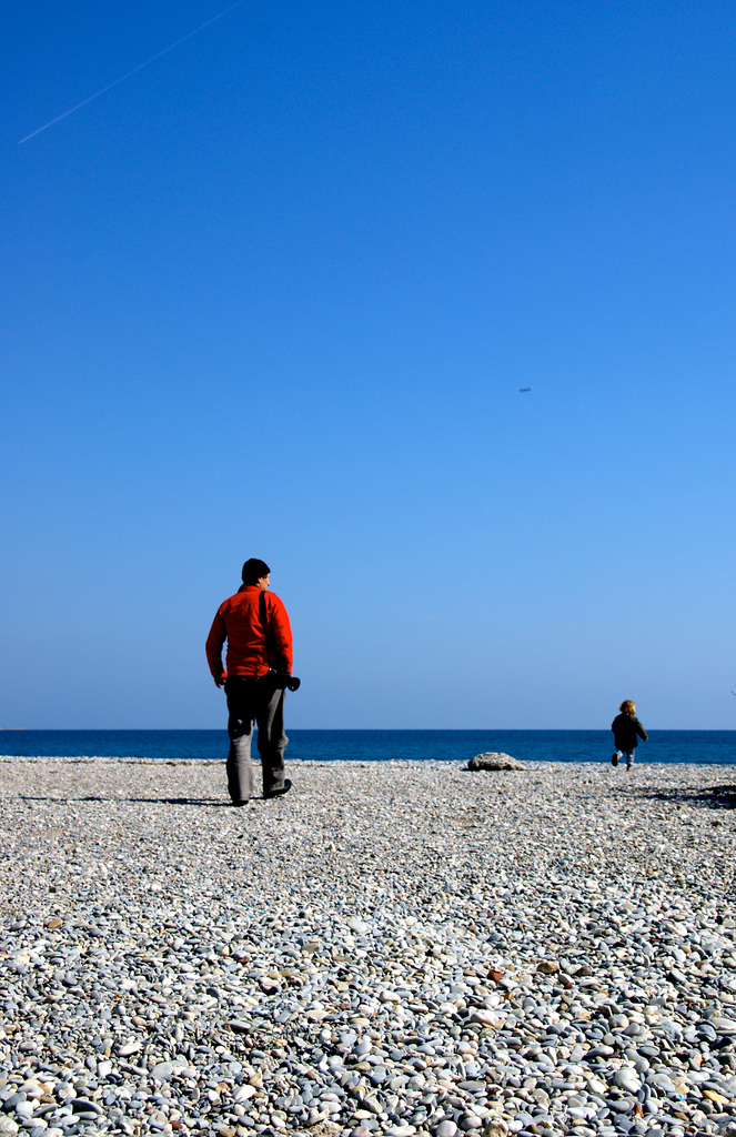 Le photographe au pull-over rouge