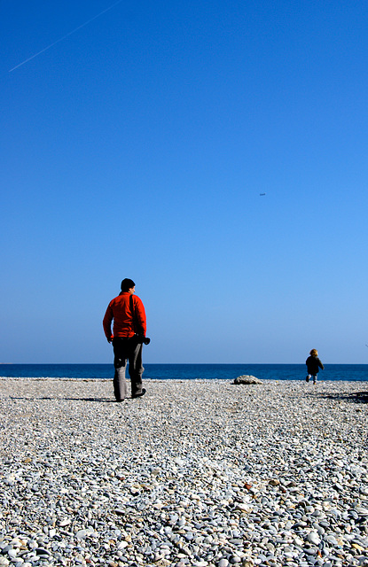 Le photographe au pull-over rouge