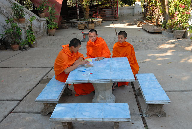 Monks in Wat Xieng Thong