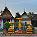 Three Buddha images at Wat Mai Suwannaphumaham