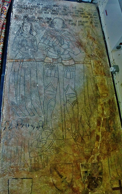 watton at stone church, herts.detail of the incised alabaster slab to john boteler and his two wives.  the first died in  1471.