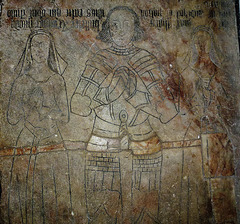 watton at stone church, herts.detail of the incised alabaster slab to john boteler and his two wives.  the first died in  1471.