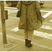 Street corner curly Mature Lady in sexy high-heeled boots and jeans /  Dame mature aux cheveux bouclés en bottes à talons hauts et jeans -  Copenhage, Danemark.  19-10-200 - Sepia