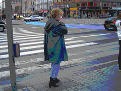 Street corner curly Mature Lady in sexy high-heeled boots and jeans /  Dame mature aux cheveux bouclés en bottes à talons hauts et jeans -  Copenhage, Danemark.  19-10-2008- Postérisation
