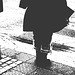 Street corner curly Mature Lady in sexy high-heeled boots and jeans /  Dame mature aux cheveux bouclés en bottes à talons hauts et jeans -  Copenhage, Danemark.  19-10-2008 - Bichromie  N & B