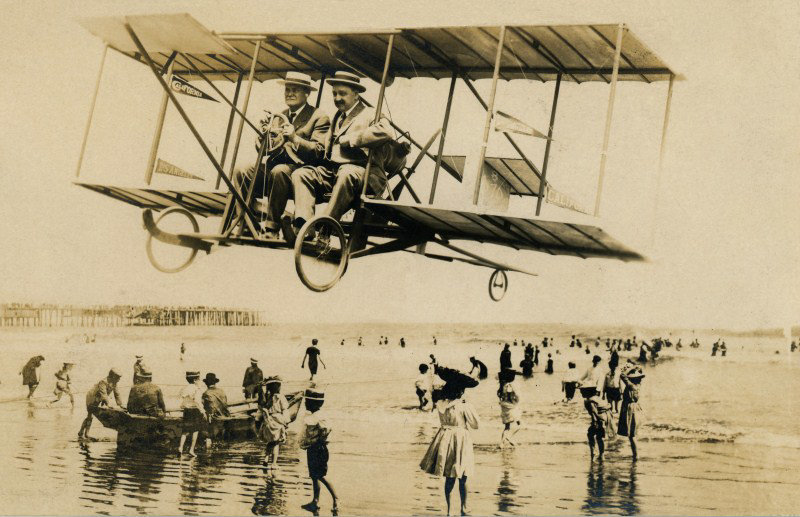 Buzzing the Beach in a Biplane, Los Angeles, Calif.