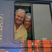 Uncle Jack, Aunt Debbie, at a Window of their Bus