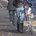 Cycliste en bottes à talons hauts / Walking Swedish biker in jeans & high-heeled boots at her cell phone - Ängelholm  / Suède - Sweden.  23-10-2008