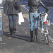 Cycliste en bottes à talons hauts / Walking Swedish biker in jeans & high-heeled boots at her cell phone - Ängelholm  / Suède - Sweden.  23-10-2008