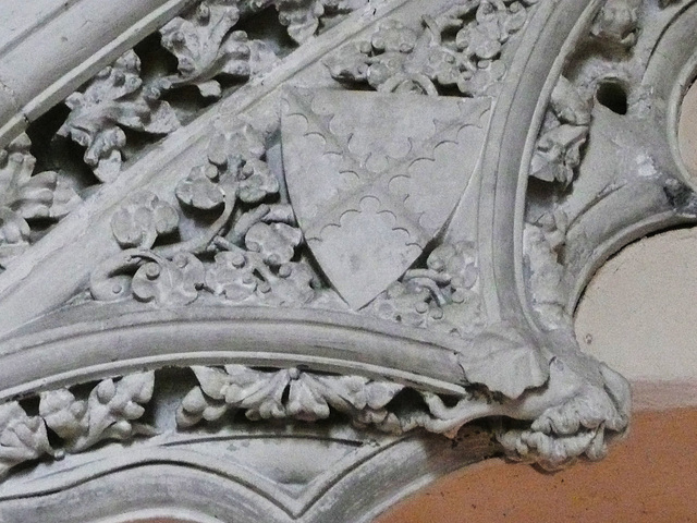 belchamp walter church, essex, john boutetort, c14 tomb canopy with square cut hole to cusps in line with tudor window. contemporary paintings cover the walls.c.1325