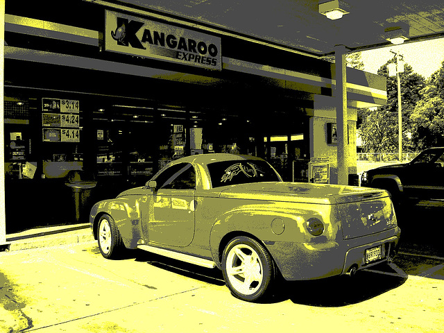 Kangaroo express red car /  Véhicule rouge kangourou - Louisiane. USA - 7 juillet 2010 - Vintage postérisé