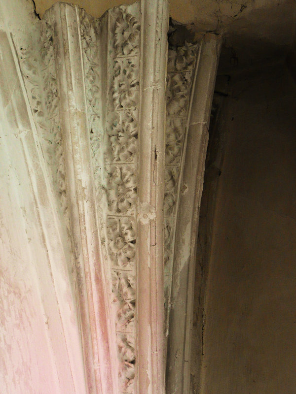 belchamp walter church, essex, john boutetort, c14 tomb canopy with square cut hole to cusps in line with tudor window. contemporary paintings cover the walls.c.1325